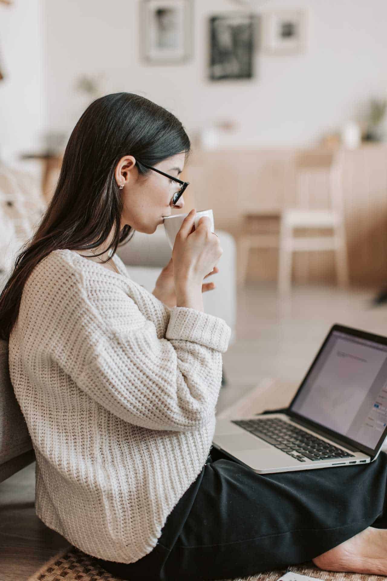 This image shows a woman carefully reading why document translation tools do not translate the entire content of the document in question.